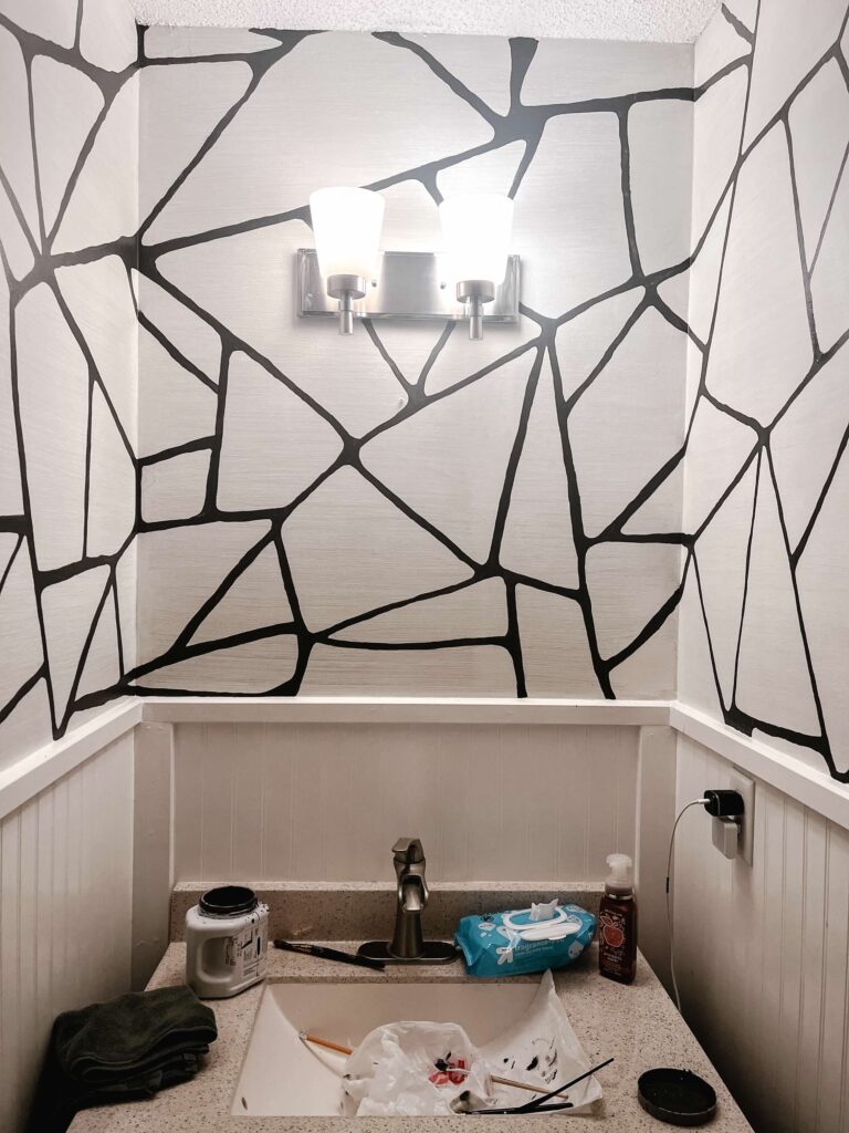 half bath finished grasscloth design painted